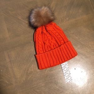 orange pom cable knit beanie